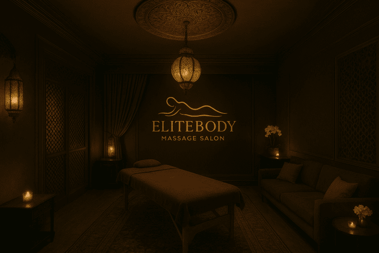 Интерьер в восточном стиле массажного салона EliteBody с мягким светом, массажным столом и уютной атмосферой